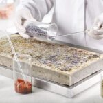 Insulation material sample being tested for heat resistance and safety in a laboratory